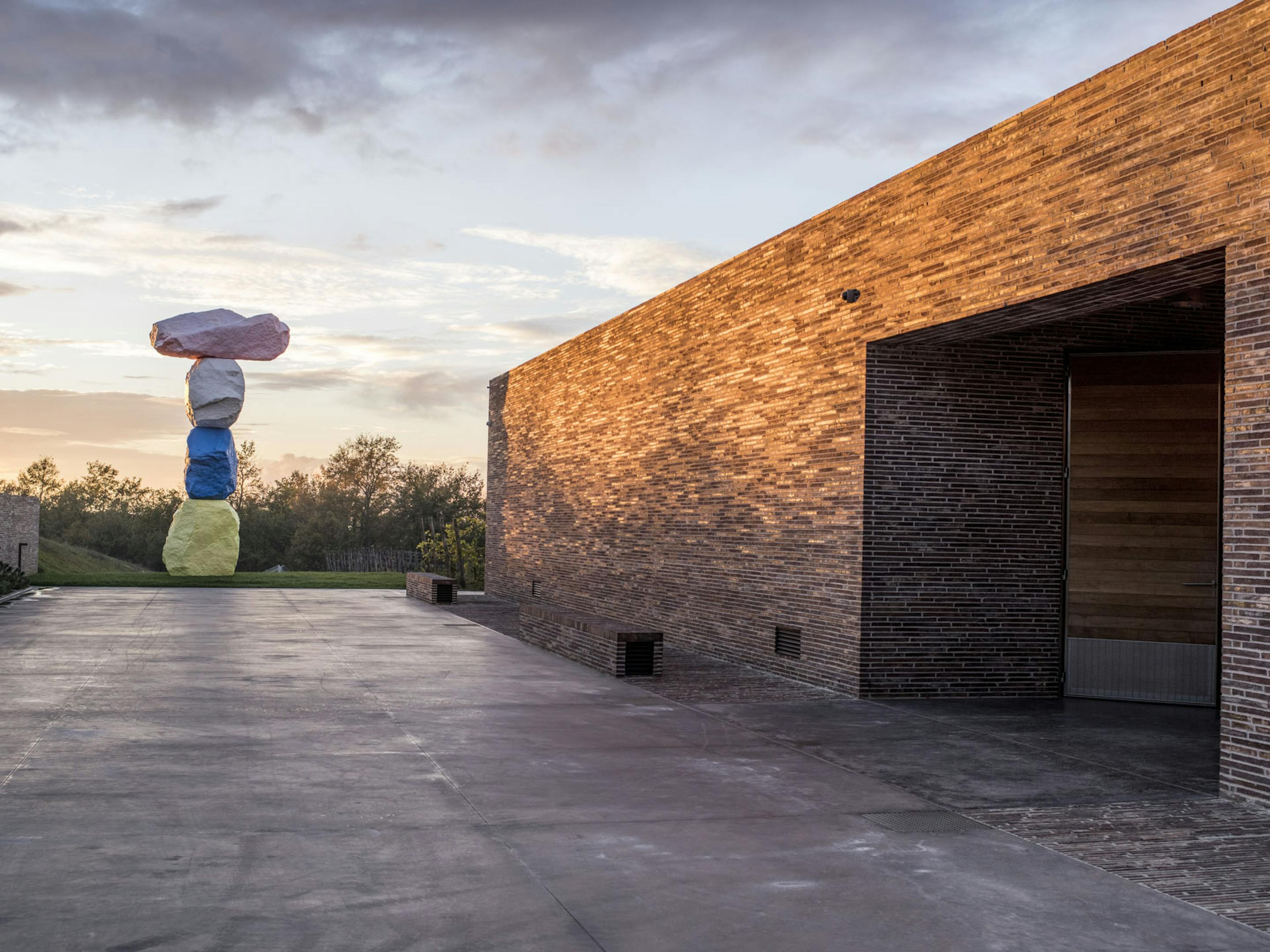 Fabbrica winery at sunset with the sculpture by Ugo Rondinone
